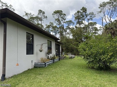 Located at 190 2nd St SE in Naples, this 2.5 acre retreat offers - photo 45