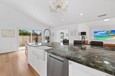 Vaulted ceilings, wide-plank floors, a polished granite - photo 14
