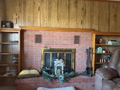 Welcome to this well-maintained brick ranch situated on 1.13