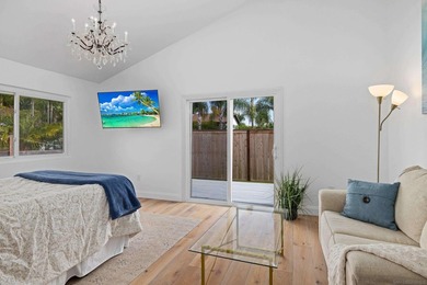 Vaulted ceilings, wide-plank floors, a polished granite - photo 23
