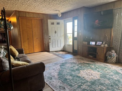 Welcome to this well-maintained brick ranch situated on 1.13