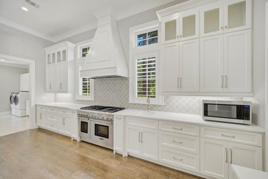 Custom-Built Pool Home in Regatta Bay Golf & Yacht Club a - photo 25