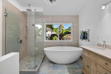 Vaulted ceilings, wide-plank floors, a polished granite - photo 26