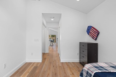 Vaulted ceilings, wide-plank floors, a polished granite - photo 33