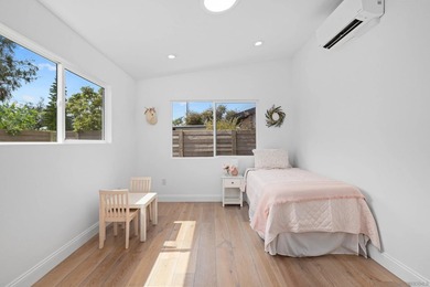 Vaulted ceilings, wide-plank floors, a polished granite - photo 34