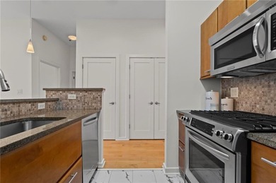 Welcome home to an elevated, turnkey condo experience in the