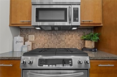 Welcome home to an elevated, turnkey condo experience in the