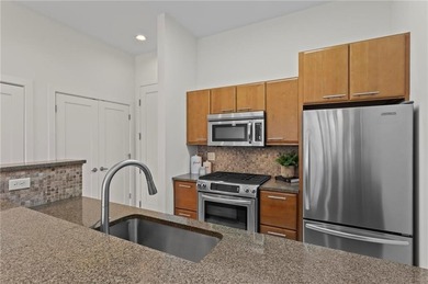 Welcome home to an elevated, turnkey condo experience in the