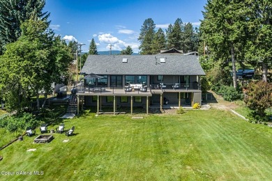 Experience refined waterfront living on .47 level acres with 100 - photo 2