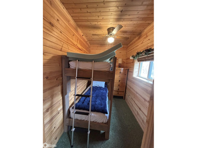 This rustic log a-frame is versatile: a great summer cabin or - photo 12