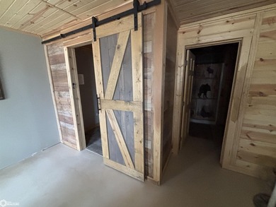 This rustic log a-frame is versatile: a great summer cabin or - photo 14