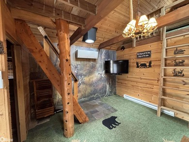 This rustic log a-frame is versatile: a great summer cabin or - photo 18