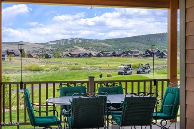 Perfectly positioned along the 9th tee box, this custom-built - photo 11