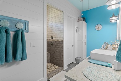 Escape to effortless coastal living in this bright and airy - photo 16