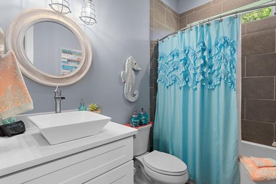 Escape to effortless coastal living in this bright and airy - photo 19