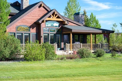 Perfectly positioned along the 9th tee box, this custom-built - photo 47