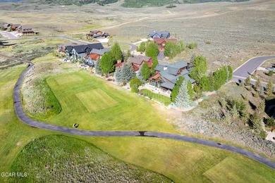 Perfectly positioned along the 9th tee box, this custom-built - photo 48
