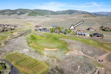 Perfectly positioned along the 9th tee box, this custom-built - photo 50