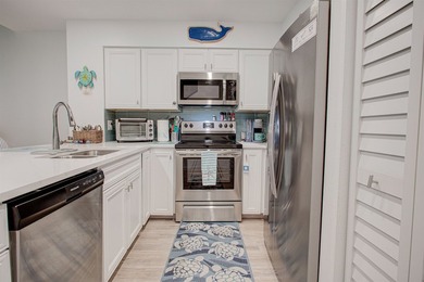 Coastal luxury meets relaxed beach living in this beautifully - photo 9