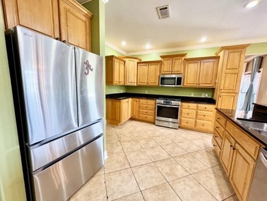 **POOL & LAKE VIEWS!**Enjoy waterfront living at its finest in - photo 6