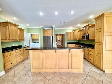 **POOL & LAKE VIEWS!**Enjoy waterfront living at its finest in - photo 7