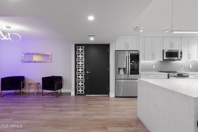 Located in the iconic Olympus Condominiums, this 2-bedroom