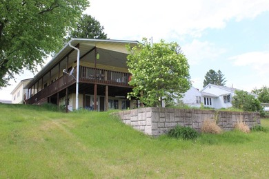 Welcome to 631 N 1st Street, a charming riverfront property - photo 3