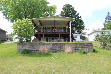 Welcome to 631 N 1st Street, a charming riverfront property - photo 4