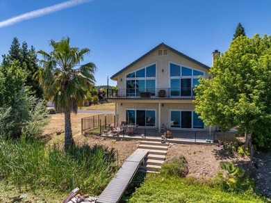Where luxury meets the shoreline. This stunning custom-built - photo 3