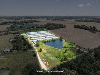 This is a very well-maintained 6-house broiler poultry farm. The - photo 1