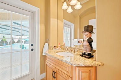 Nestled within the gated community of Soundside Shores, this - photo 12