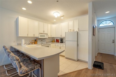 Big views. Two slips. Zero hassle lake living. This 3BR/2BA