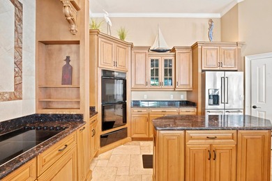 Nestled within the gated community of Soundside Shores, this - photo 14