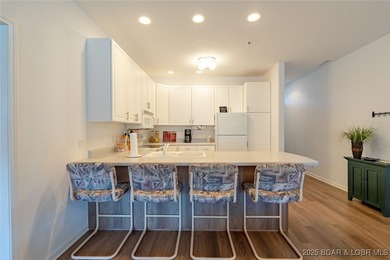 Big views. Two slips. Zero hassle lake living. This 3BR/2BA