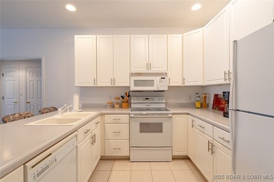 Big views. Two slips. Zero hassle lake living. This 3BR/2BA