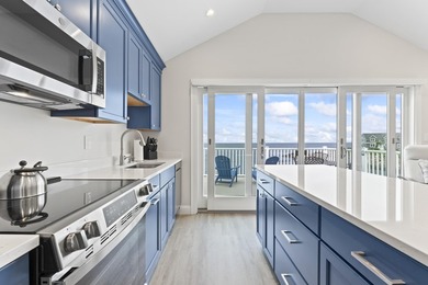 Enjoy refined seaside living with this exceptional dual-unit - photo 9