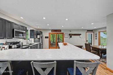 Turnkey and fully furnished, this beautifully updated 4-bedroom - photo 7