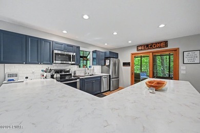 Turnkey and fully furnished, this beautifully updated 4-bedroom - photo 9
