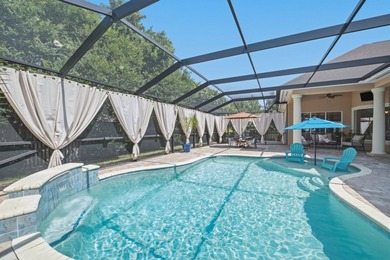 Nestled within the gated community of Soundside Shores, this - photo 45