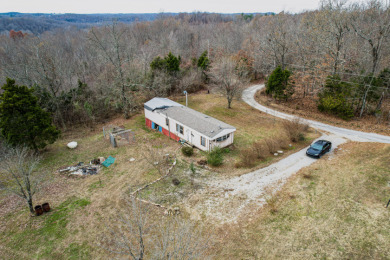 Secluded 0.49-acre Lot and Mobile Home  SOLD - Lake Home SOLD! in Hudson, Kentucky