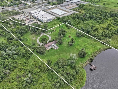 A Gorgeous 8.87 Acre Lakefront Parcel Zoned Mixed Use in the - photo 15