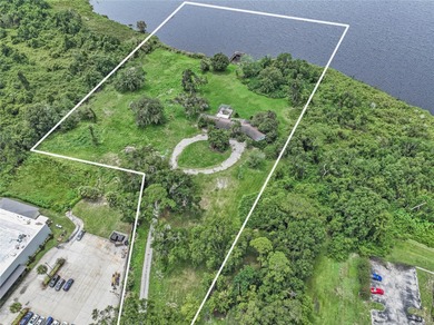 A Gorgeous 8.87 Acre Lakefront Parcel Zoned Mixed Use in the - photo 17