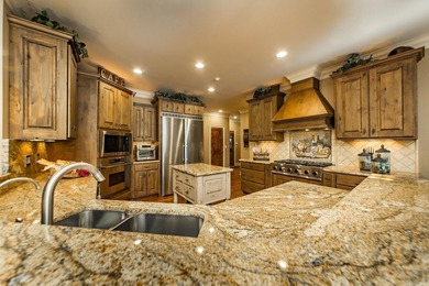 Experience the pinnacle of lakefront luxury in this furnished - photo 18
