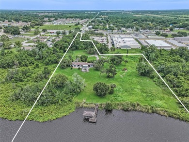 A Gorgeous 8.87 Acre Lakefront Parcel Zoned Mixed Use in the - photo 18