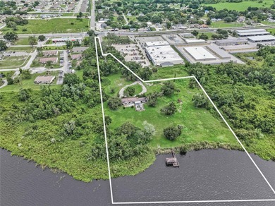 A Gorgeous 8.87 Acre Lakefront Parcel Zoned Mixed Use in the - photo 19
