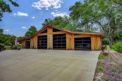 Tucked away on nearly 4.64 private acres, this one-of-a-kind - photo 6