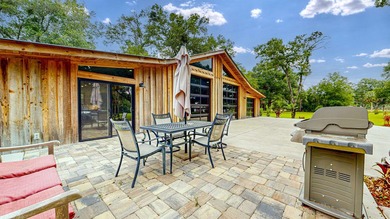 Tucked away on nearly 4.64 private acres, this one-of-a-kind - photo 10
