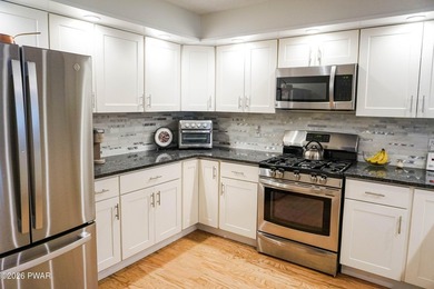 ENJOY THIS RENOVATED, MAINTENANCE FREE LIVING TOWNHOUSE NEAR - photo 3