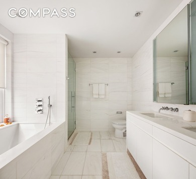 Perched high above the city, this exceptional full-floor - photo 11
