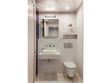 Perched high above the city, this exceptional full-floor - photo 13